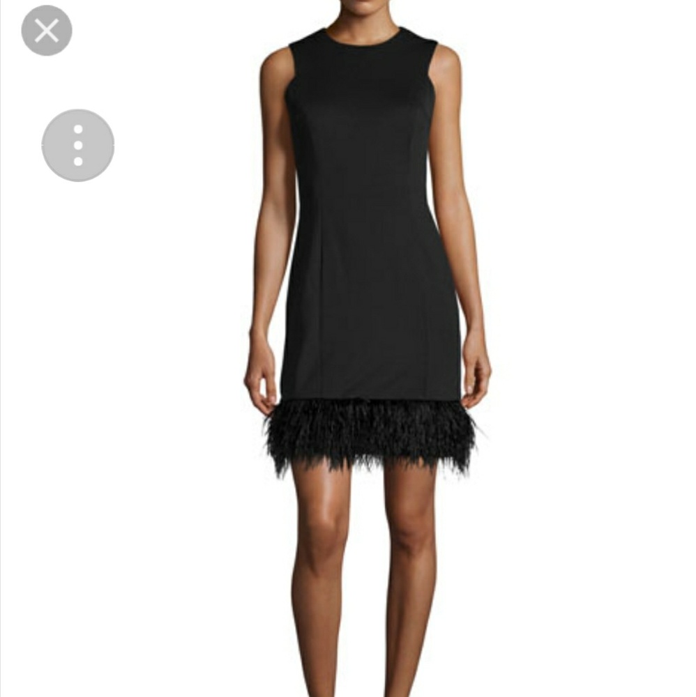 Black scuba dress with feather hem detail